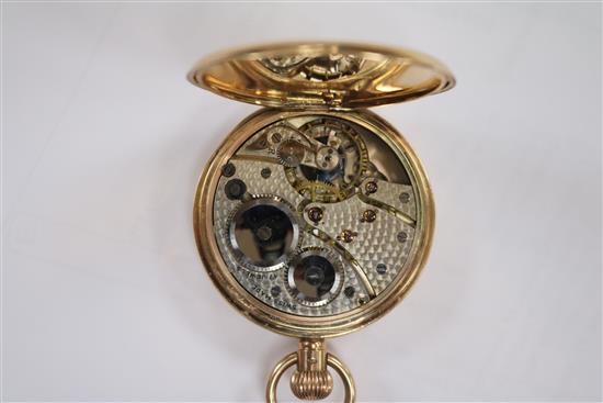 A 1920s JW Benson 9ct gold keyless half hunter pocket watch.